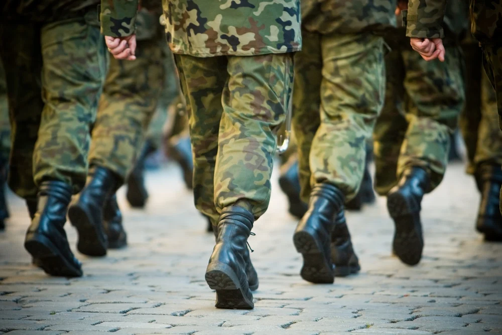 Soldiers march in formation Community is a key aspect for success in rehab for veterans