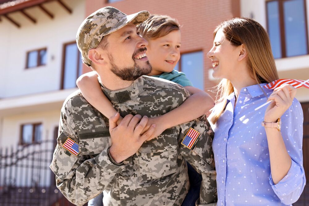 veteran at home with family after getting PTSD and addiction treatment