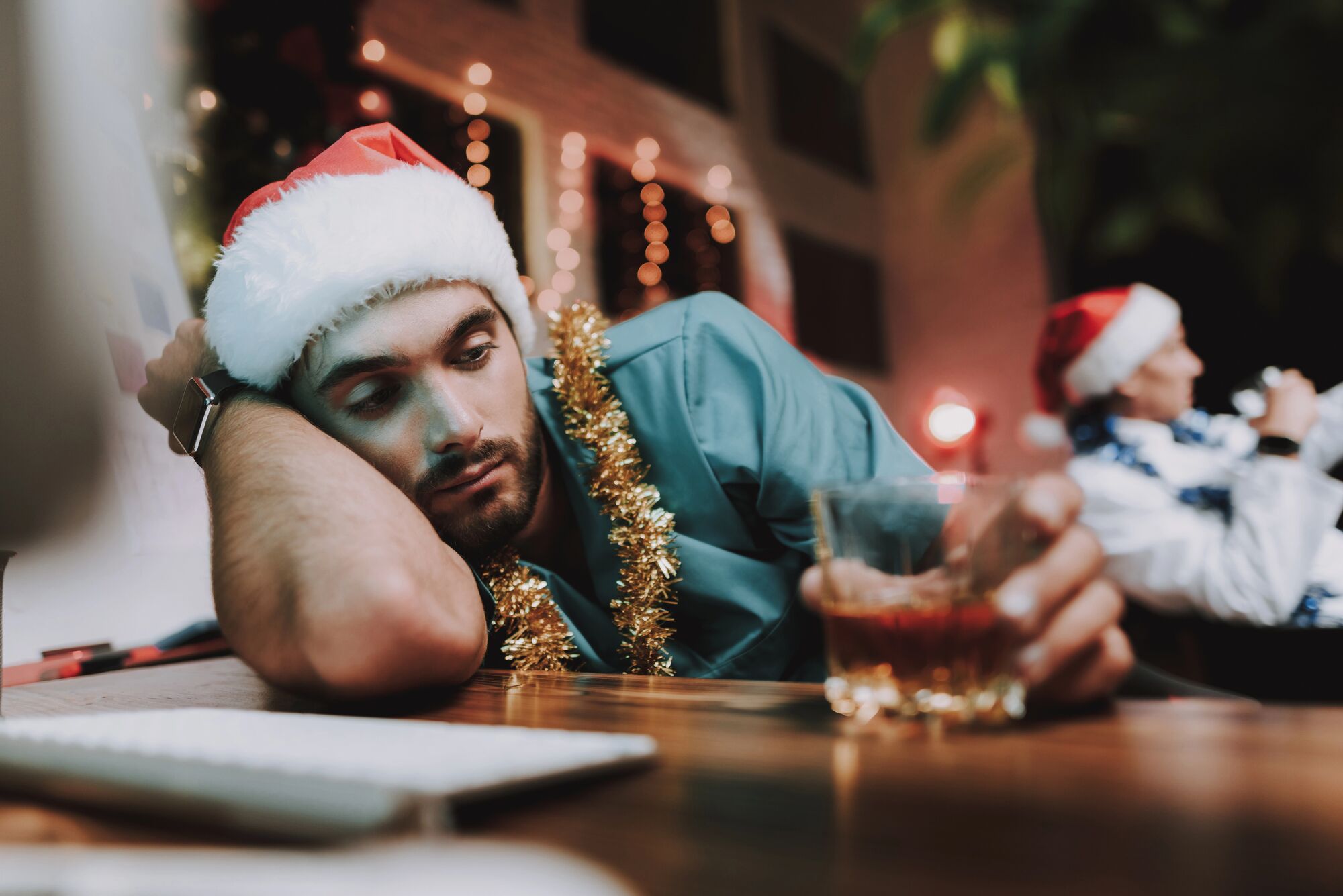 young man dealing with Holiday mental health and substance use