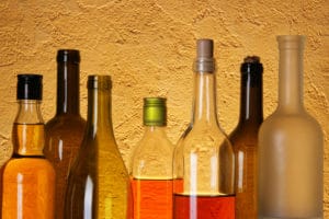 bottles of alcohol against wall